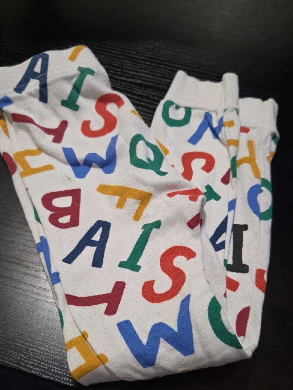 Old Navy White Kids Pajama Set with Red, Blue, Yellow, Green Prints